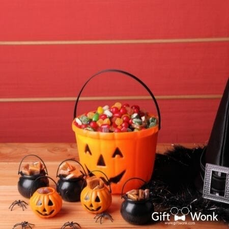 Halloween buckets filled with treats and candies 