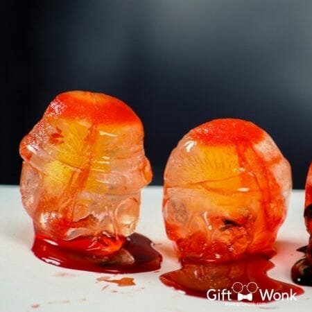 Enchanting Halloween Party Gift Ideas for a Screaming Good Time! 138 Halloween Party Gift - Halloween melting iced skulls with dripping red blood