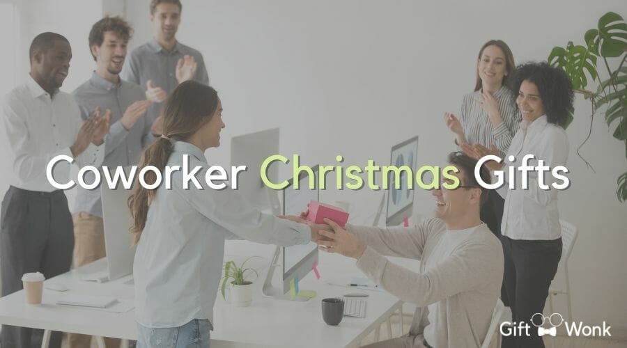 Christmas Gift Ideas for Coworkers article title image with coworkers in the office exchanging gifts in the background